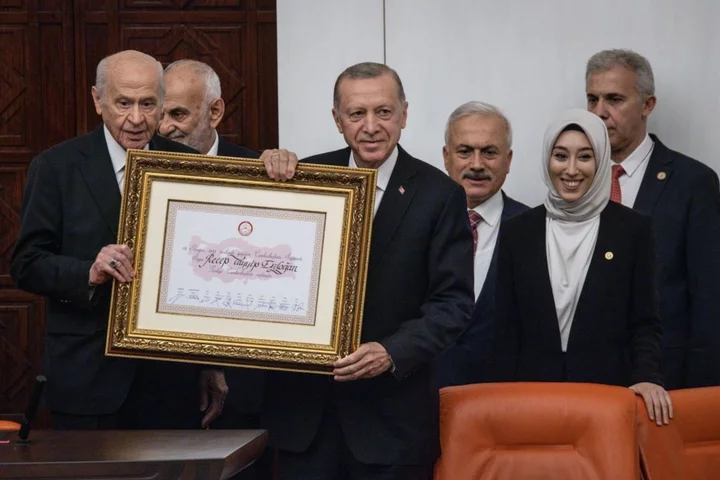 Erdogan Taps Markets Veteran Simsek as Finance Minister