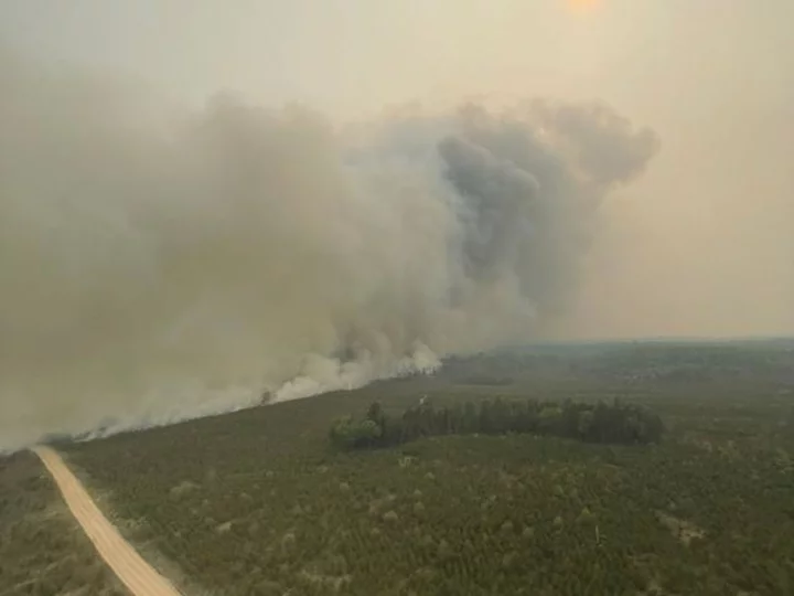 Northern Michigan wildfire burns through 3,600 acres, forcing evacuations and the closure of a nearby highway