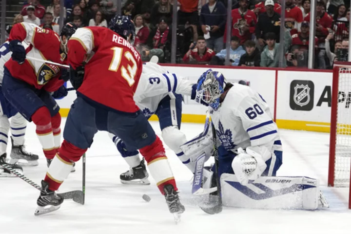 Woll stops 24, Maple Leafs avoid elimination by topping Panthers 2-1 in Game 4