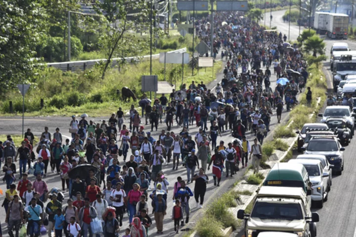 Some 5,000 migrants set out on foot from Mexico's southern border, tired of long waits for visas