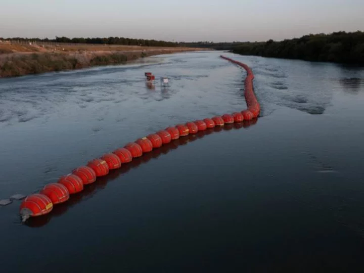 Federal appeals court says Texas' floating barriers can remain in Rio Grande for now