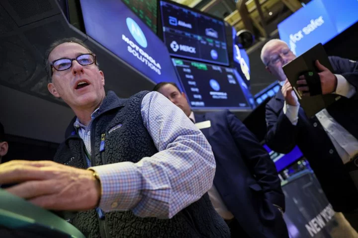Wall St rises as yields slip, traders assess economic data