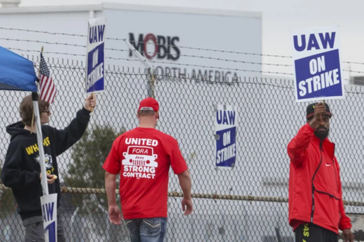 United Autoworkers strikes grow as 7,000 more workers hit pickets against Detroit's big automakers