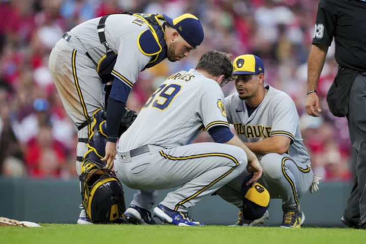 Brewers’ Burnes nearly faints in sweltering heat, fans 13 in 1-0 win over Reds