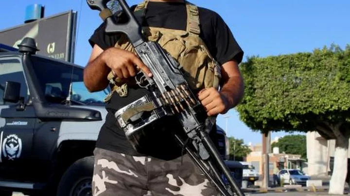 Libya militias battle in Tripoli after commander's arrest