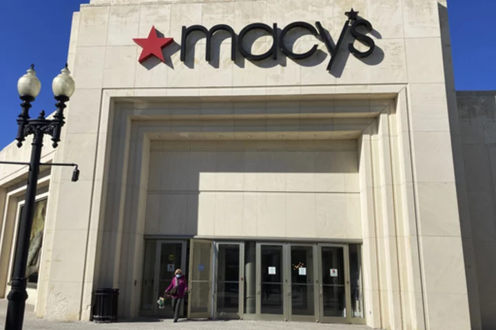Macy's had to discount spring goods to entice cautious consumers and sees more warning signs ahead