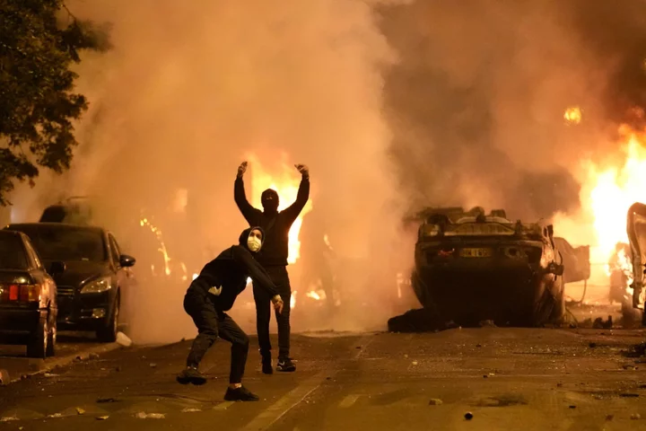 Paris riots – latest: Police officer who shot teen dead under investigation for homicide as 150 arrested