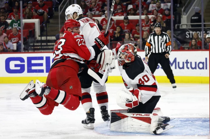 Jesper Fast scores on OT deflection, Hurricanes eliminate Devils in Game 5