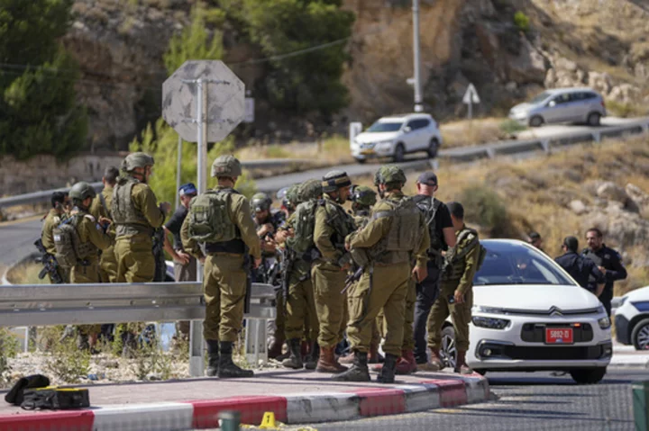 Palestinian gunman opens fire on a car in the occupied West Bank wounding 3, including 2 girls