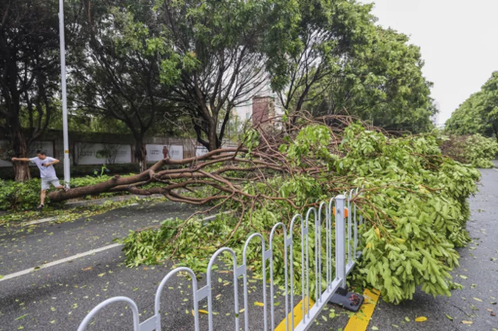 Typhoon Doksuri is downgraded to tropical storm status as it leaves southern China