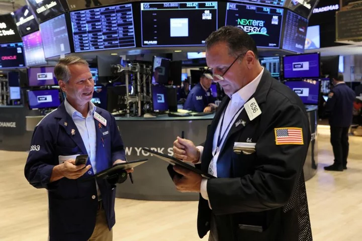 Wall St eyes lower open as investors digest more big bank earnings