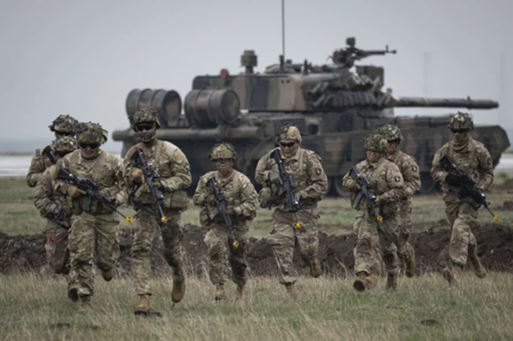 NATO readies military plans to defend against bruised but unbowed Russia