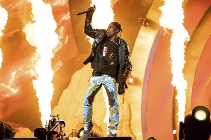 Rapper Travis Scott will not face criminal charges in Astroworld crowd surge, his lawyer says