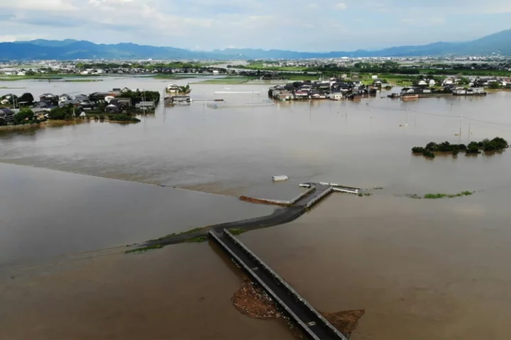 One dead as Japan warns of 'heaviest rain ever' in southwest