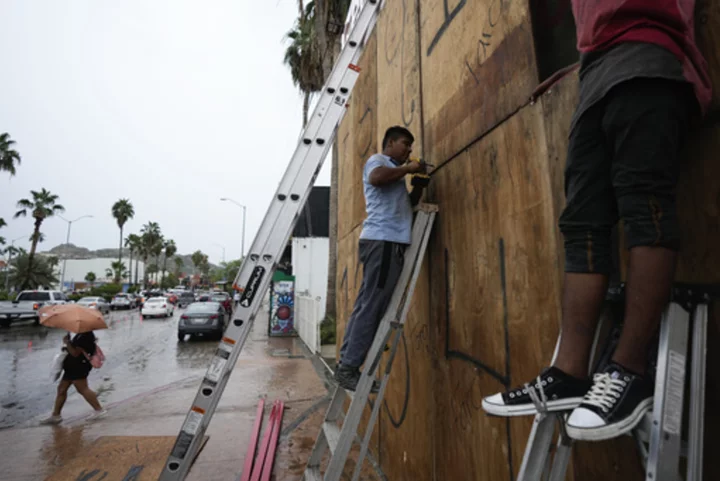 Hurricane Norma takes aim at Mexico's Los Cabos resorts, as Tammy threatens islands in the Atlantic