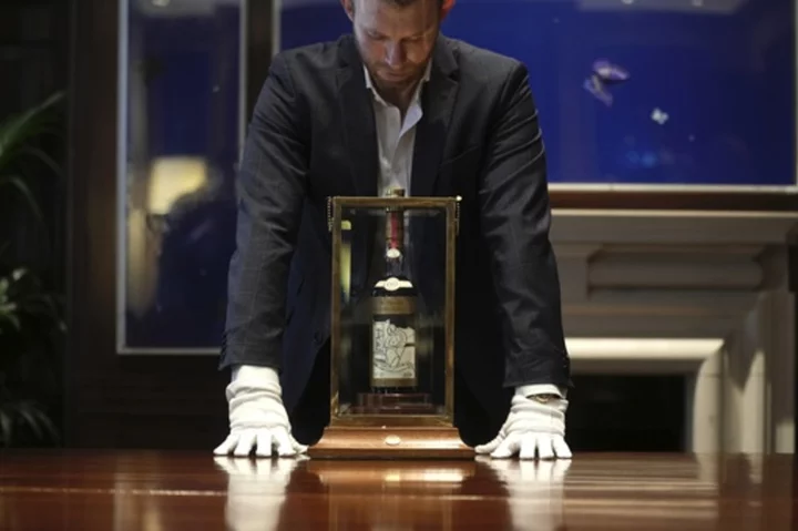 Cheers! A bottle of Scotch whisky sells for a record $2.7 million at auction