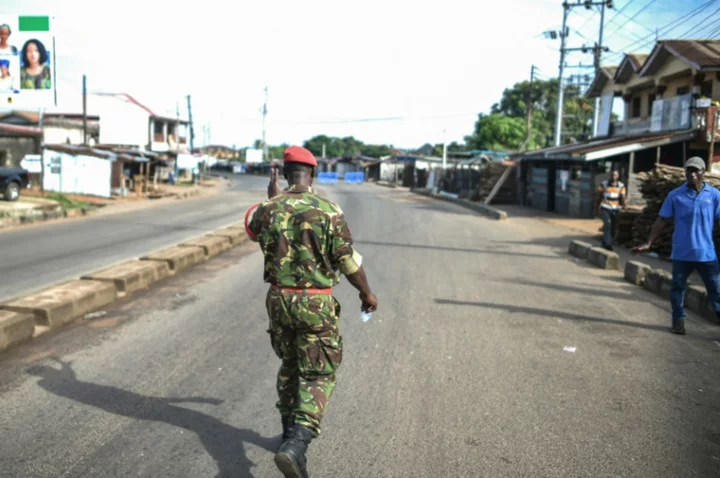 Curfew partially lifted in SLeone capital after clashes killed 13 soldiers