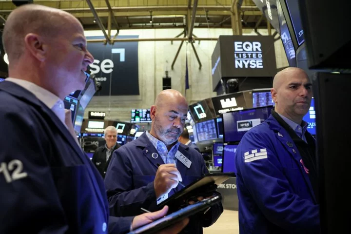 Wall Street gyrates, Treasury yields spike on robust data, solid earnings