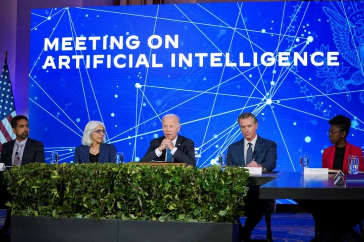 Biden says there is need to address security, economic risks posed by AI