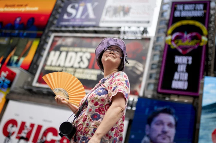 Nearly 200 million people in US are under heat, flood advisories