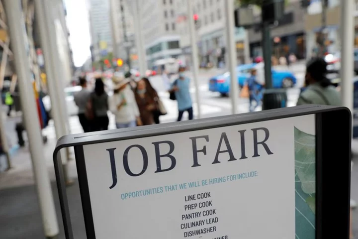 US weekly jobless claims fall; labor market still slowing