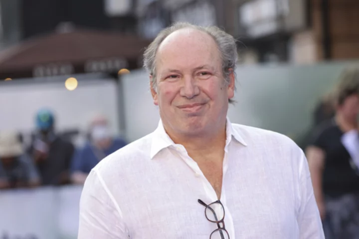 Film composer Hans Zimmer proposes to his partner on London stage, prompts raucous audience response