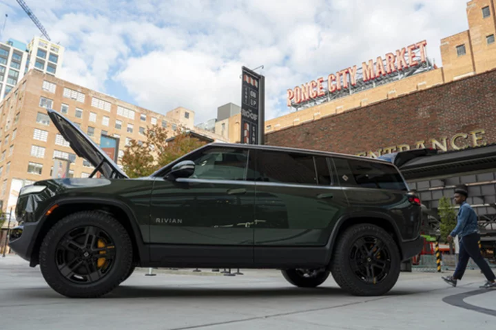 Electric truck maker Rivian says construction on 1st phase of Georgia factory will proceed in 2024