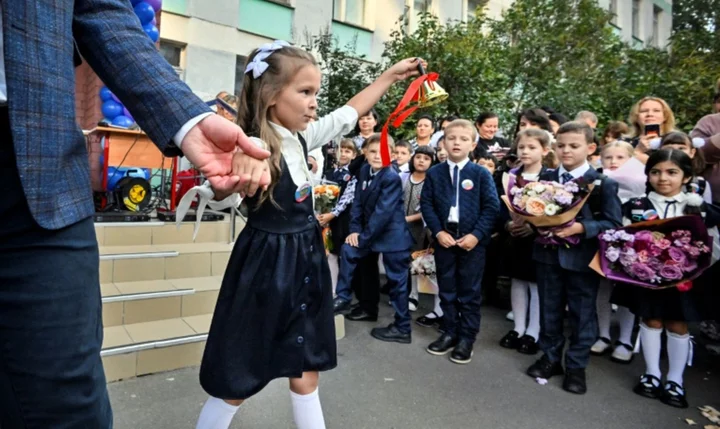 Russian parents send children for patriotic school year