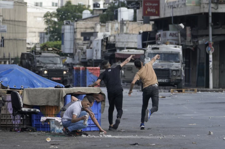 Israeli forces kill 2 Palestinians in shootout in the occupied West Bank