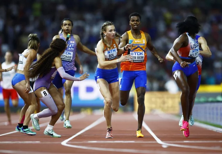 Athletics-U.S. win mixed relay with world record as Bol falls