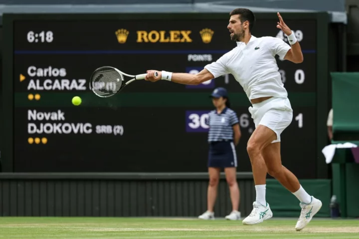 Alcaraz beats Djokovic in five sets to win first Wimbledon title