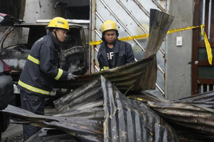 Rain and a wrong address delayed firefighters reaching a Philippine factory blaze. 15 people died