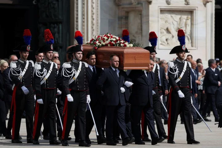 Berlusconi's clan reunites at funeral as succession looms