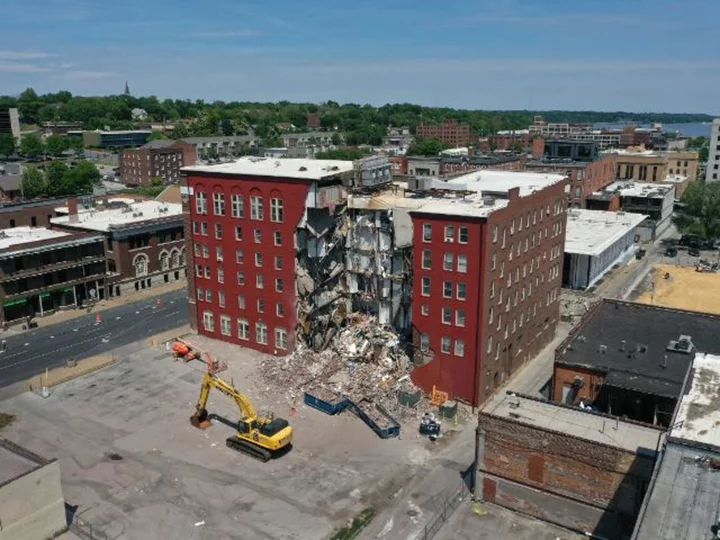 Report: 9th person saved from a collapsed Iowa apartment building after city officials had made plans to begin demolition