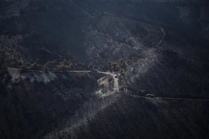 Greek fire officials arrest 2 for arson as multiple wildfires continue to burn across the country