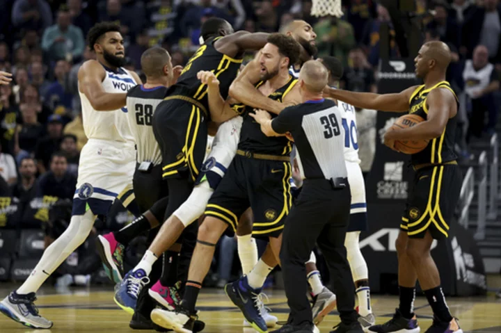 Green ejected for headlock, Thompson, McDaniel tossed after scuffle in Timberwolves-Warriors game