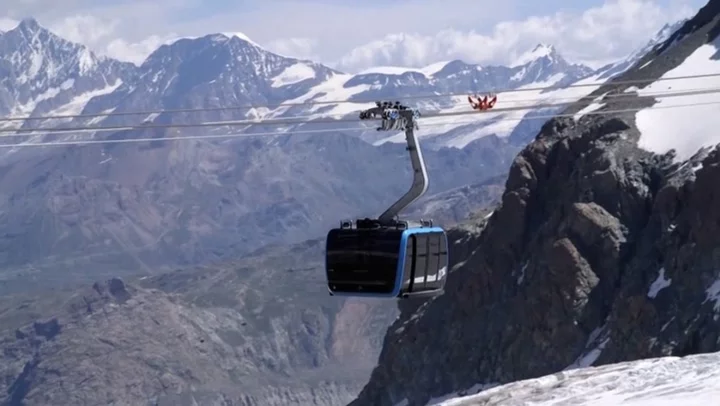 Stunning views over Alps glacier from new cable car linking Switzerland and Italy