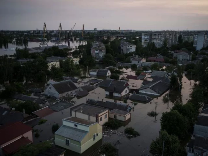 At least 16 dead in Kakhovka dam collapse flooding, Kyiv says