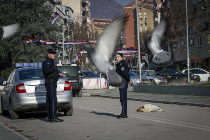 Kosovo's new mayor takes up post peacefully in minority area as West warns against ethnic violence