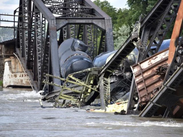 Cleanup begins at the site of a Montana train derailment and Yellowstone River bridge collapse
