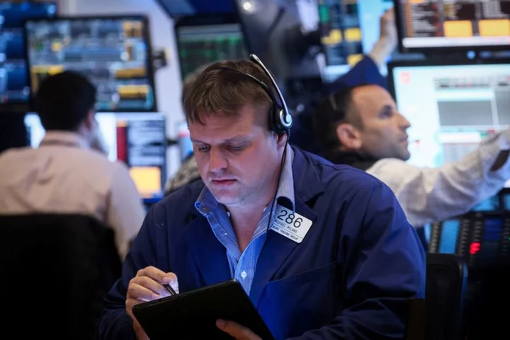 Wall St opens muted as investors weigh chances of June rate pause