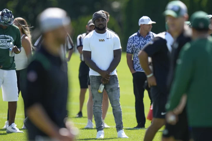 Dalvin Cook visits with the Jets and watches practice as he considers his options
