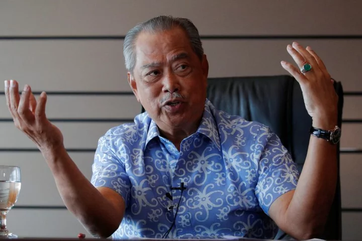 Malaysia court throws out abuse of power charges against former PM Muhyiddin