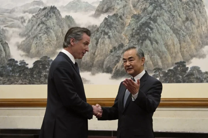 Senior Chinese leaders greet California Gov. Newsom with warm words in a rare cordial display