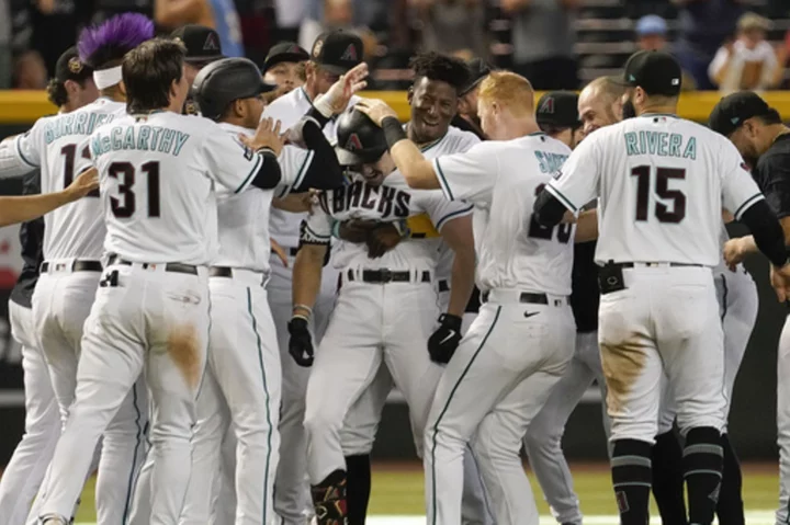 Corbin Carroll lifts Diamondbacks past Rockies for share of NL West lead