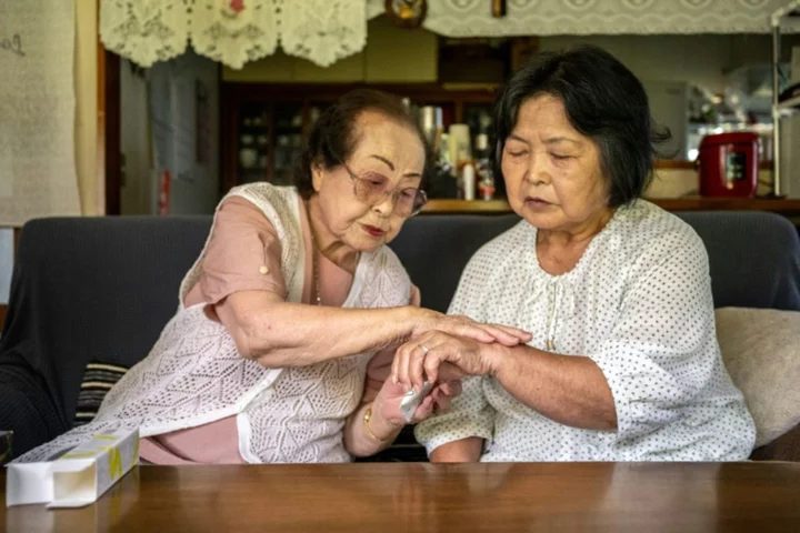 World's oldest beauty adviser sitting pretty