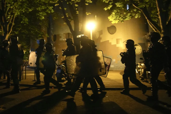 France arrests more than 1,300 people after fourth night of rioting over teen's killing by police