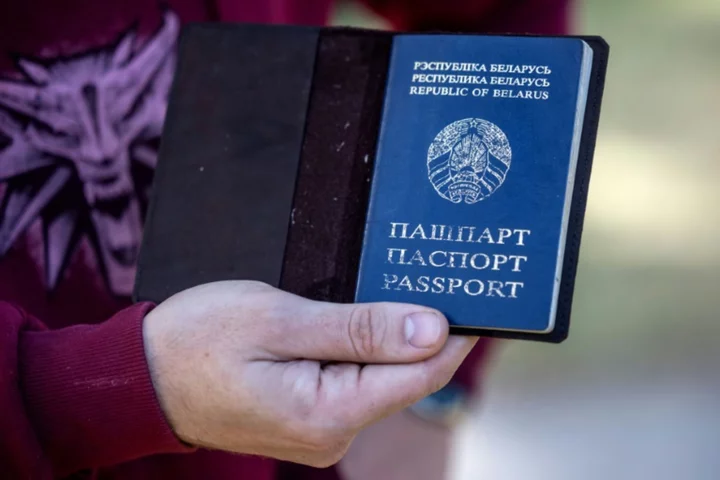 Stripped of passports, Belarusian exiles lose hope