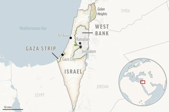 Palestinian militants launch dozens of rockets into Israel. Sirens are heard across the country