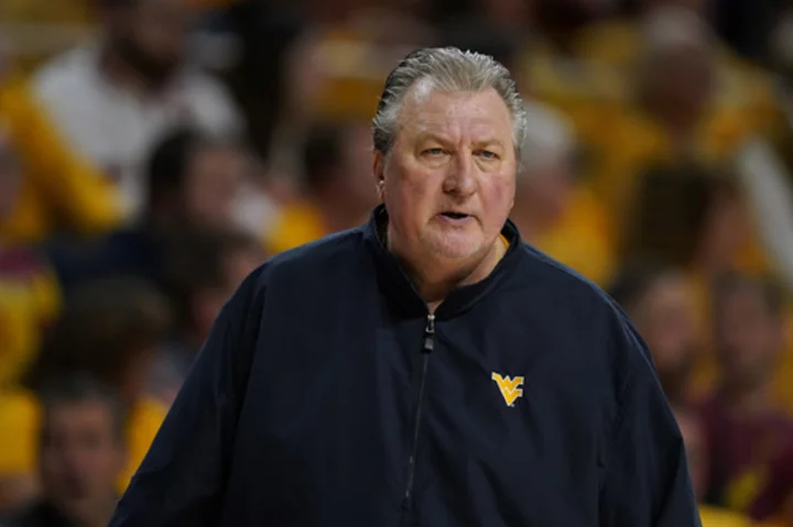 West Virginia basketball coach Bob Huggins resigns hours after drunken driving arrest